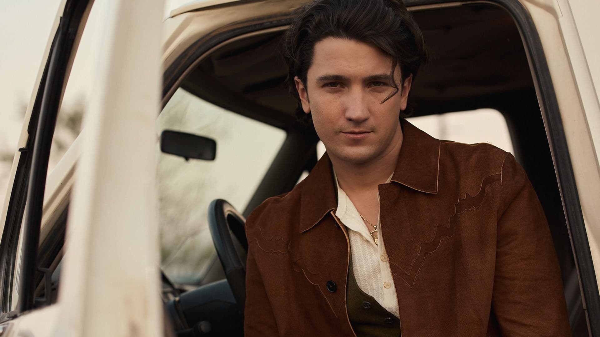 Promotional graphic for Drake Milligan