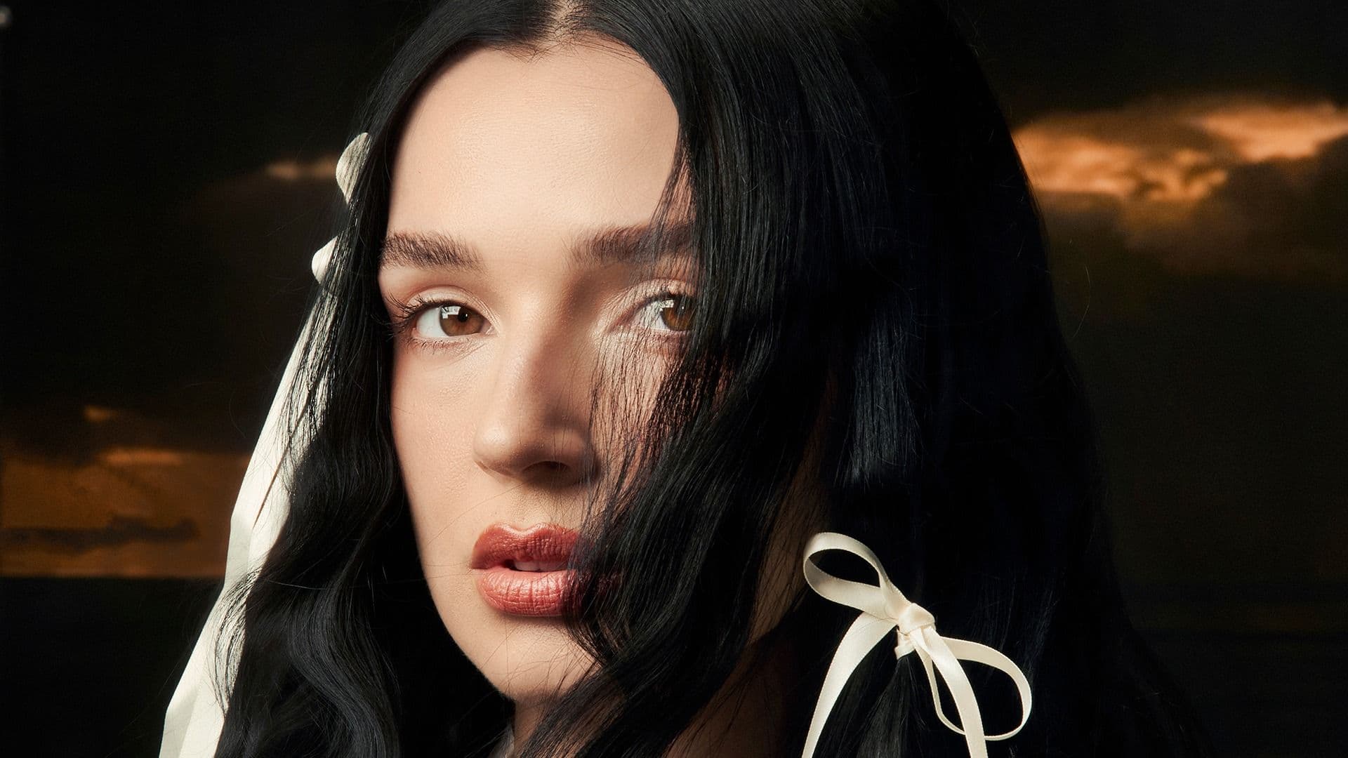 Promotional graphic for Poppy