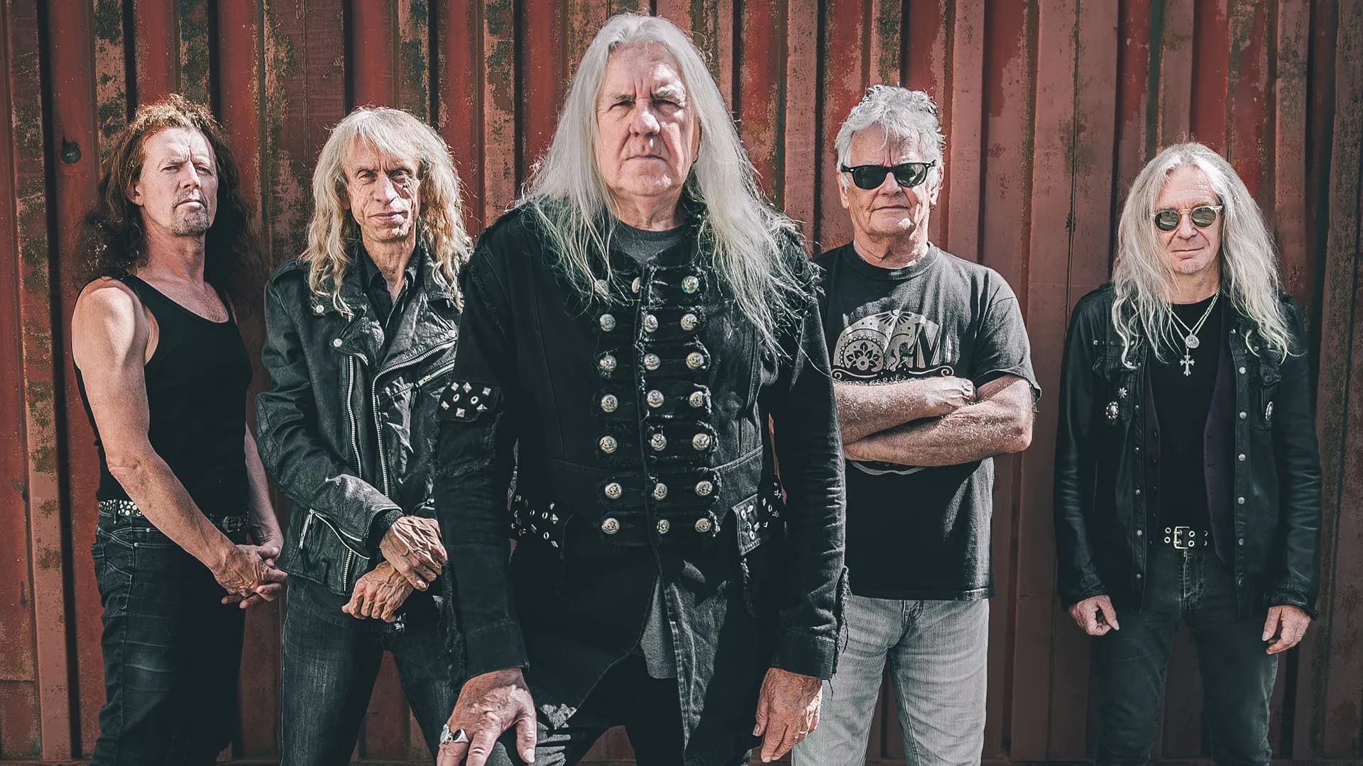 Promotional graphic for Saxon